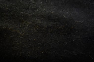 Arkaplan için siyah kağıt dokusu kullanımı metin yerleştirmek için boş alana sahiptir