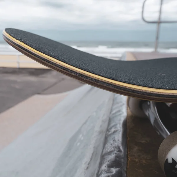 Skateboard on top of ramp