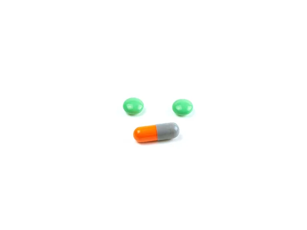 Green Pills Orange Capsules Isolated White Background Medicines Tablets Drug — Stock Photo, Image