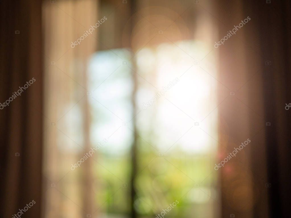 Window with curtains and sunlight