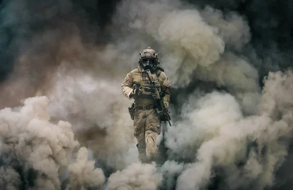 Swat forces with gas mask between smoke and gas in battle field