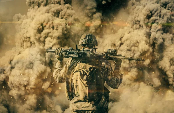 Soldier between smoke and explosion in battle field