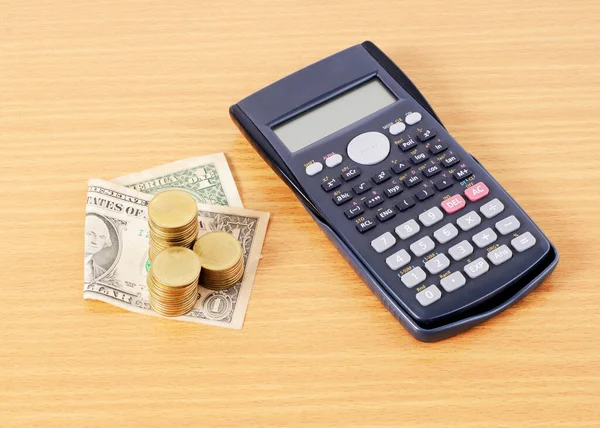 Calculator Dollar Money Coins Stack Wooden Desk — Stock Photo, Image