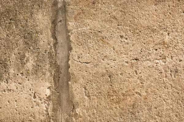 Vieux plâtre abîmé sur les murs des maisons gros plan — Photo