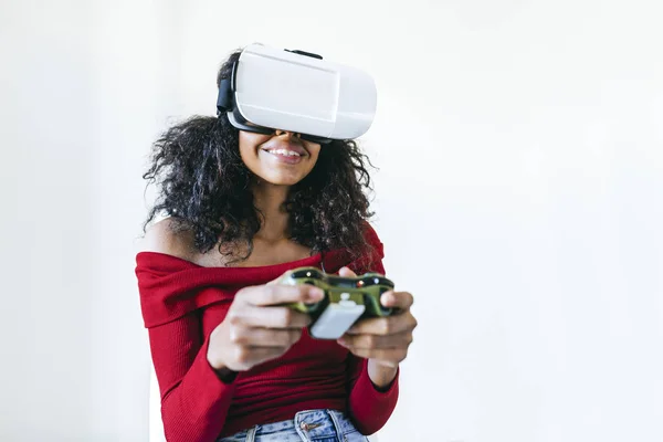 Woman playing with virtual reality glasses.