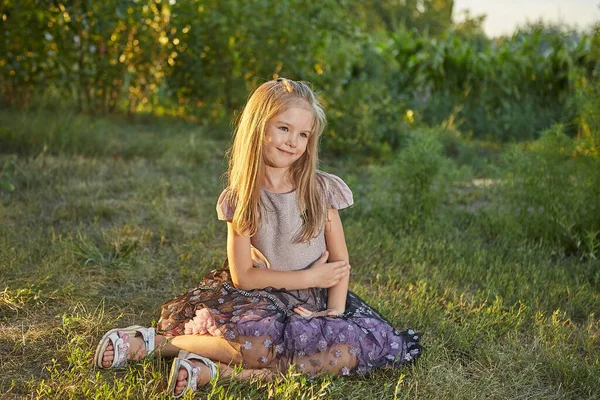 Little Charming Girl Sitting Grass Summer Garden Sunset — Stock Photo, Image