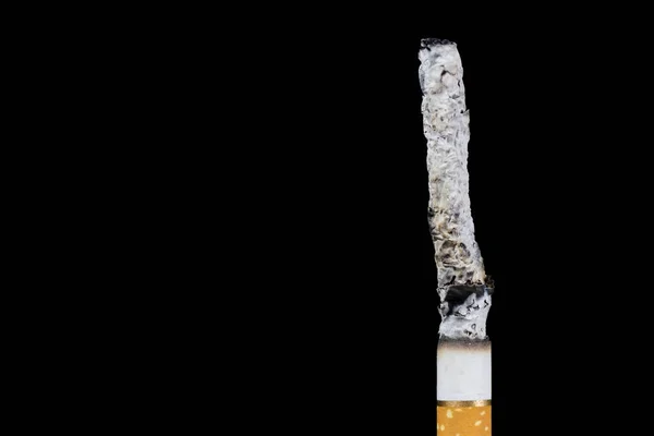 Smoking cigarette on black background — Stock Photo, Image