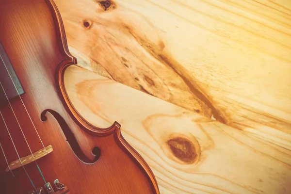 Violin on wooden background — Stock Photo, Image