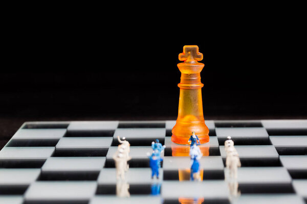 business miniature team with chess background