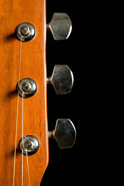 Head of acoustic guitar on black background — Stock Photo, Image