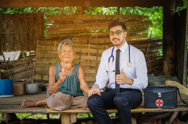 Family medicine visits the  elderly woman in rural