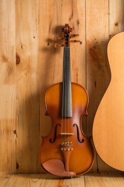 ahşap keman ve gitar. arka plan, natürmort