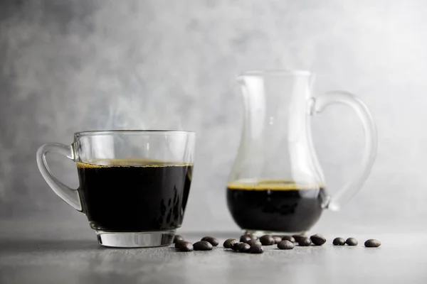 Xícara transparente de café e café com backgrou concreto — Fotografia de Stock