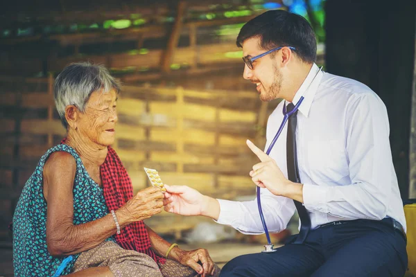 Family medicine visits the  elderly woman in rural