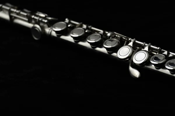 flute music instrument on black background