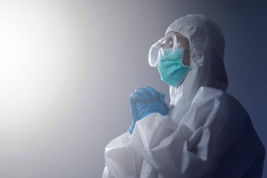 Doktor ya da sağlık ekibi kişisel koruyucu ekipman ya da PPE, Coronavirus ya da Covid-19 salgını konseptinde