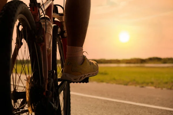 cyclist with sunlight background, healthy life style