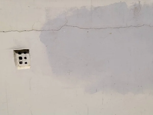 Pintura, textura. Mapa de topes. La textura de una pared lisa y áspera. Avión de relevo. Color gris equilibrado. Reflejo de luz . — Foto de Stock
