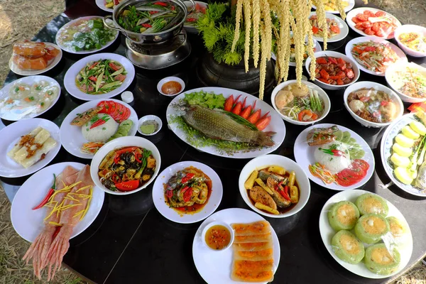 Variety of food on party table, group of Vietnamese food model imitation from Vietnam cuisine make by plastic, colorful of popular food with noodle, vegetables, soup, roll from high view