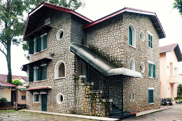 French architecture of ancient stone house with green wooden win — Stock Photo, Image