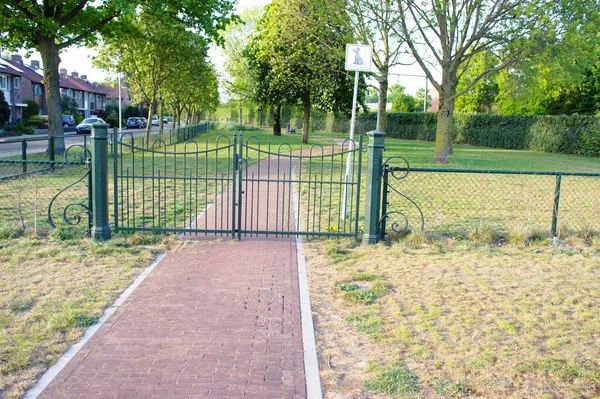 Closed Metal Gate Gives Access Dog Walking Area Next Residential — Stock Photo, Image