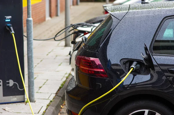 Power plug of a electric car with the charger cable attached