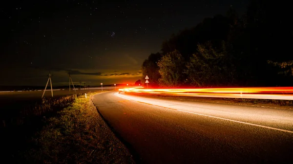 Light Track Car Leaving Turn Background Highway Starry Highway — Stock Photo, Image