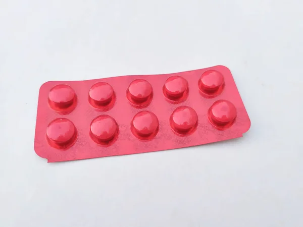Κόκκινο Δισκίο Φάρμακο Απομονώθηκε Λευκό Φόντο — Φωτογραφία Αρχείου
