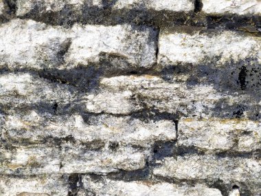 Eski bej taş duvar arka plan doku yakın çekim