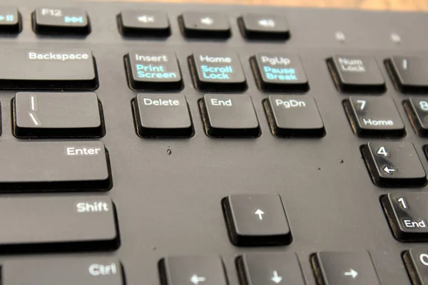 a black color computer keyboard
