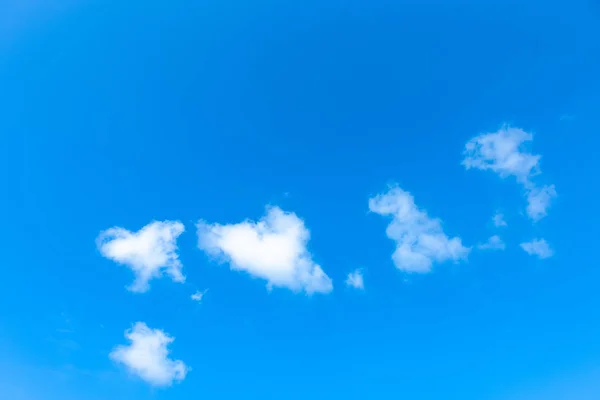Nature Bright blue Sky with white clouds on blackground. Beautif