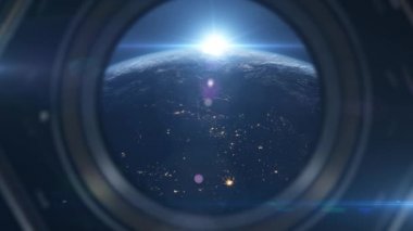 Güneş doğarken Dünya 'nın üzerinde uzay gemisi