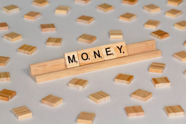 Scrabble Word Game Wood Tiles Spelling Money — Stock Photo, Image