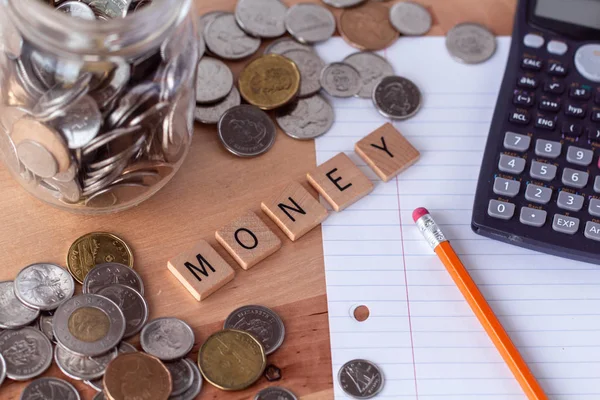 Money Spelled Out Wooden Letter Tiles Money Pencil Paper Calculator — Stock Photo, Image