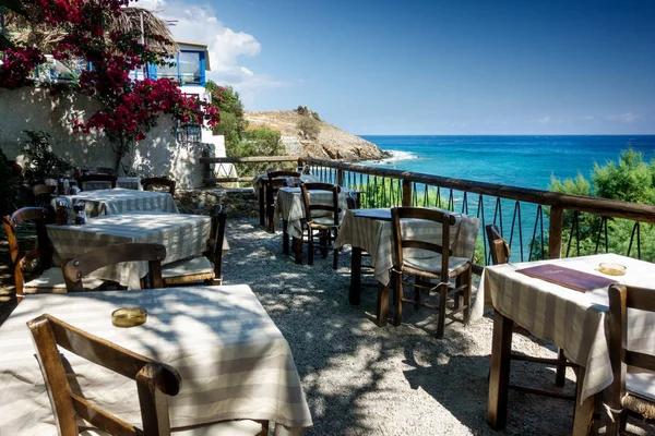 Outdoor cafe by sea, Crete, Greece
