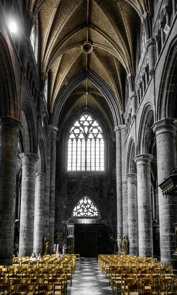 Empty chairs and interior of church, Belgium
