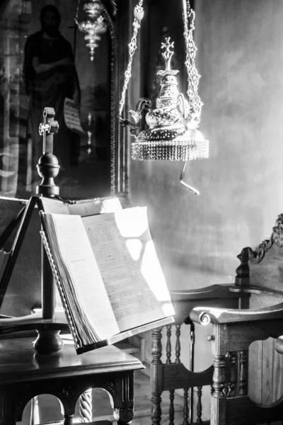 Bible under sunlight in chapel, Greece