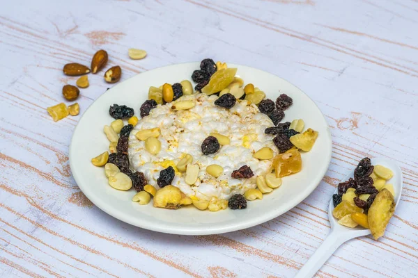 Close-up of dried fruits and rice waffles on the plate. Health f