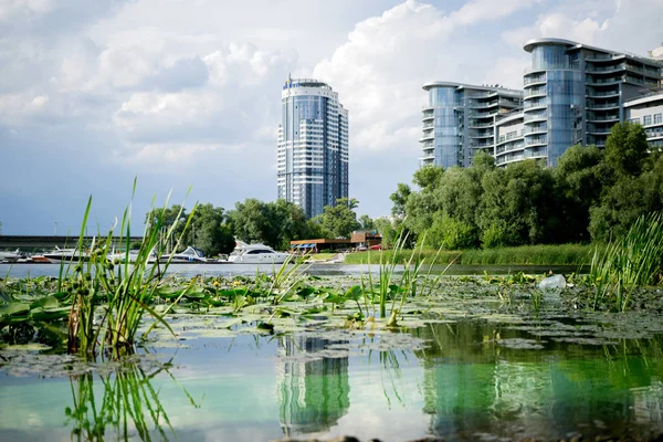 Bad water concept. Ecology problem in Kyiv, green water, with ch