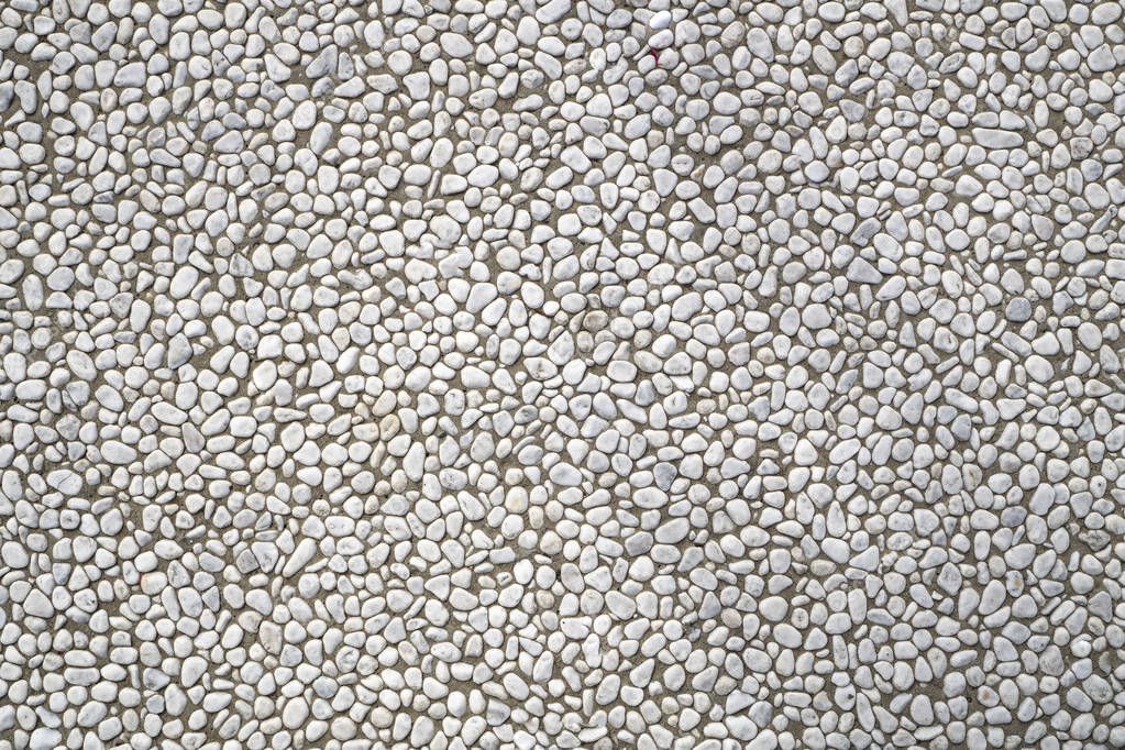 Pavement pebless stone seemless background texture