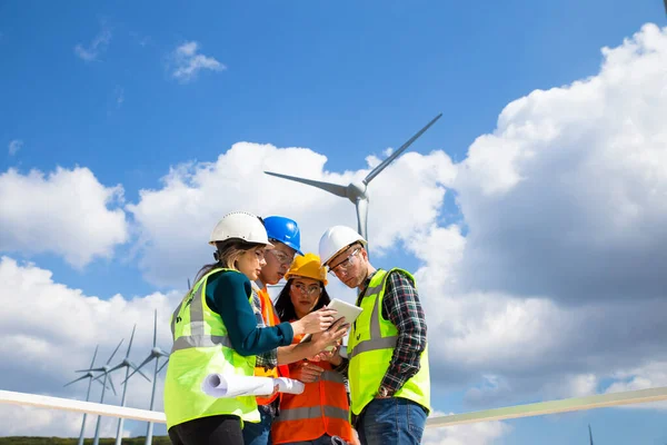 Young Engineers Workers Having Meeting Wind Farm — Stock Photo, Image