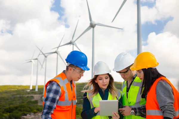 Young Engineers Workers Having Meeting Wind Farm — Stock Photo, Image