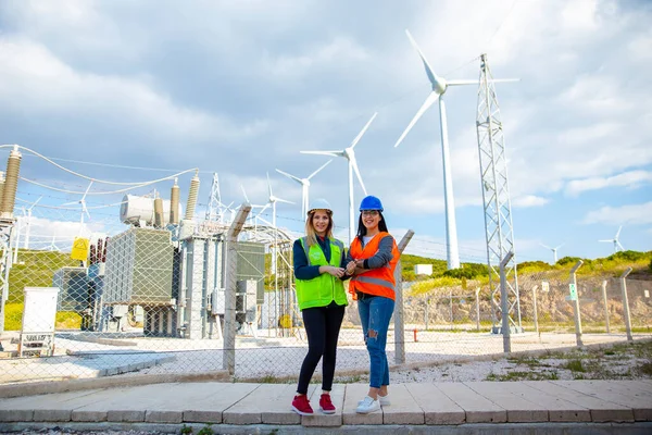 Two Young Electrical Female Engineers Protective Workwear Standing Working Checking — Stock Photo, Image