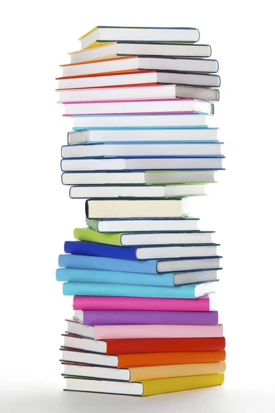 Spiralne stos kolorowych książek tęczy — Zdjęcie stockowe