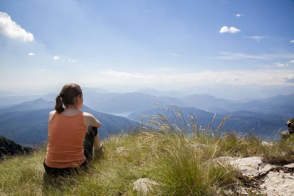 Woman on mountain top