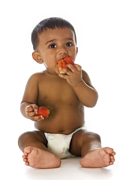 Adorable Healthy Indian Baby Sitting Floor Eating Strawberries Isolated White — Stock Photo, Image