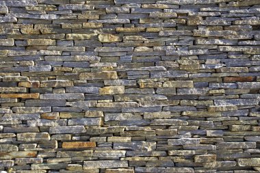 Yığılmış kayrak tuğla duvar dokusu
