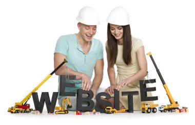 İnşaat halindeki web sitesi: Neşeli adam ve kadın web sitesi kuruyor