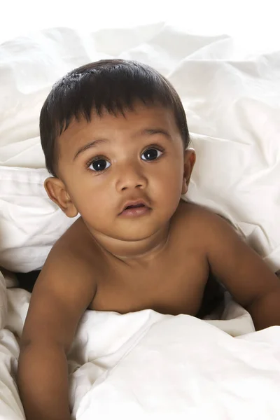 Adorable Indian baby lying on blanket — Stock Photo, Image