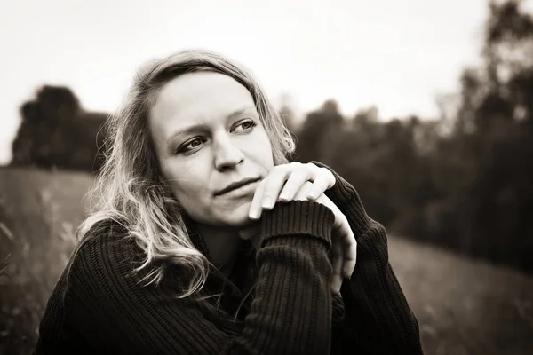 Girl pondering over something — Stock Photo, Image